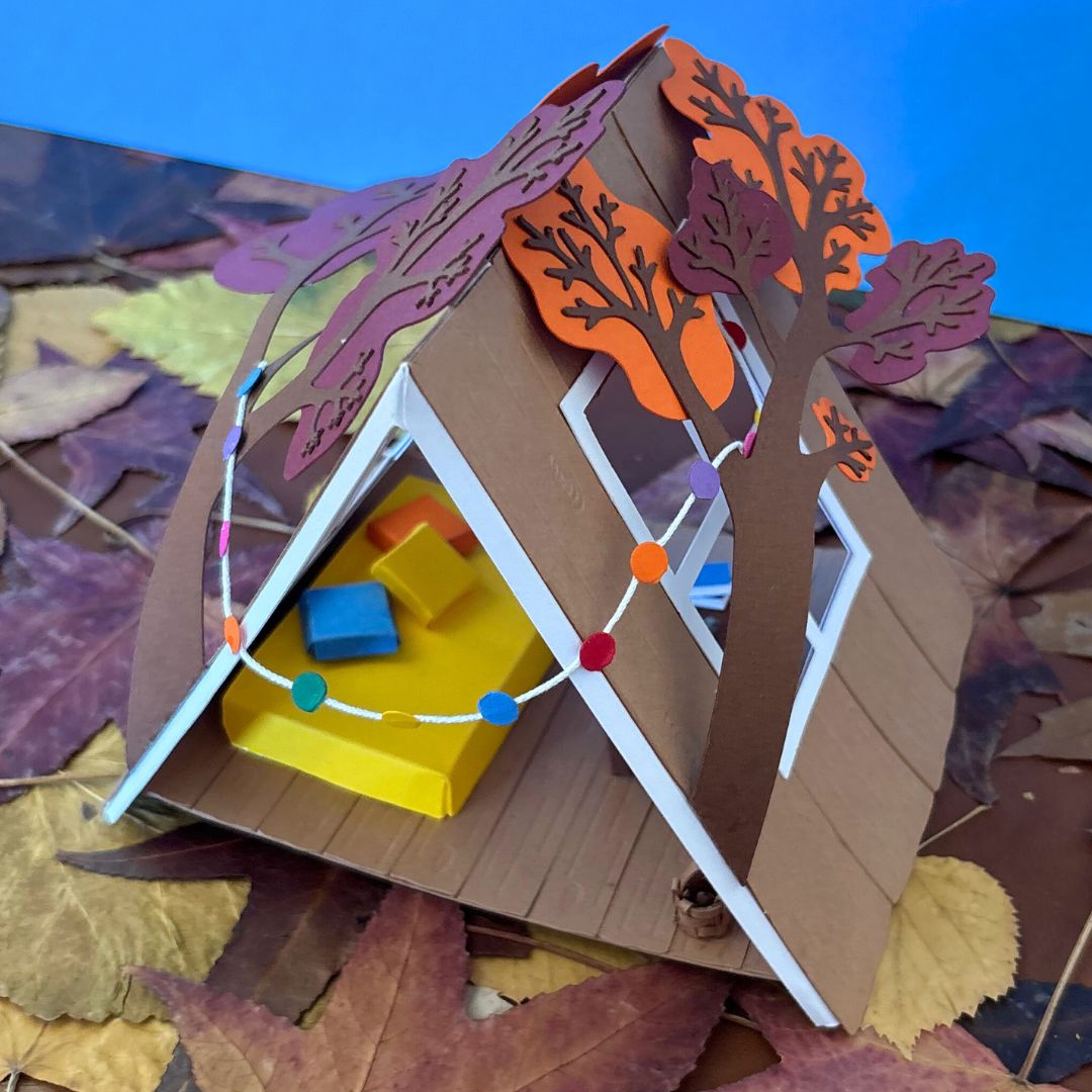 Kit créatif en papier permettant de réaliser une cabane miniature