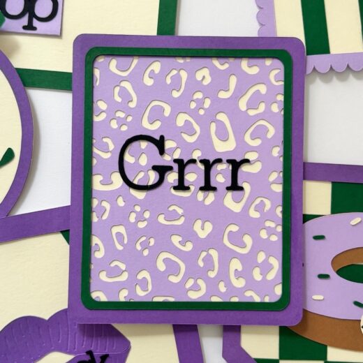 Mini-cadre à message décoratif avec l'onomatopée "Grrr" symbolisée par le fond léopard